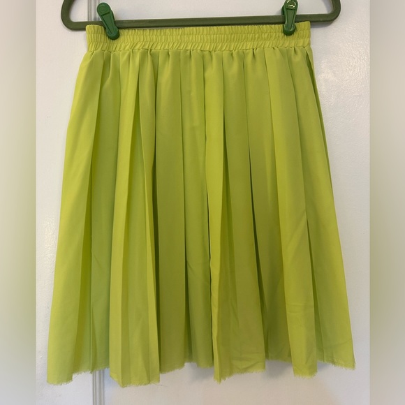Anthropologie Dresses & Skirts - Lime green pleated Anthropologie skirt, size M